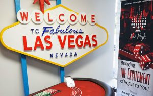 Ace High Ribbon Cutting - Welcome to Las Vegas sign